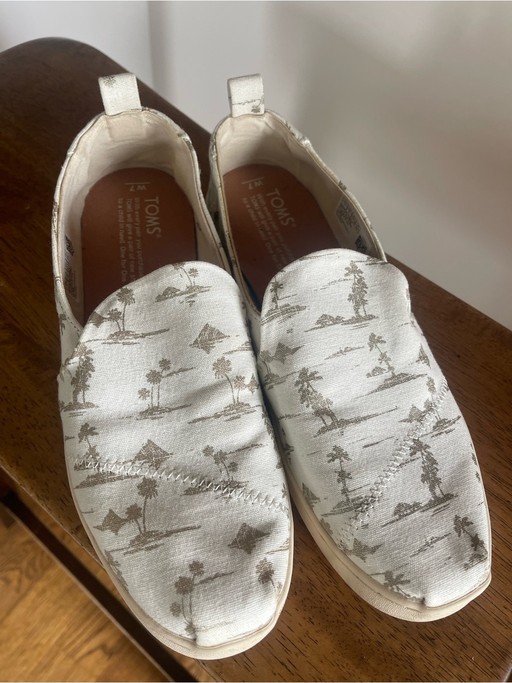 TOMS White Canvas Slip-Ons with Taupe Palm Print